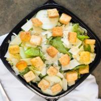 Caesar Salad · Romaine lettuce tossed with Caesar dressing & shaved parmesan cheese.  (956 Cal)