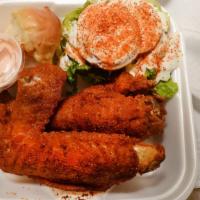 #7 Wing Delight · 1 flat, 1 drum, side salad, 1 roll and 1 sauce.
