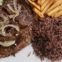 Palomilla Steak Lunch · Beef Sirloin steak pan-fried and topped with sauteed onions- cooked medium to well done.
