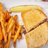 Patty Melt · Beef patty with melted American cheese and caramelized onion, all served between two slices ...