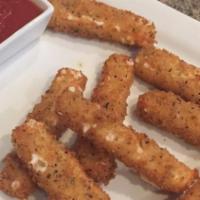 Mozzarella Cheese Sticks · Vegetarian. Seasoned, breaded, and fried golden brown. Served with marinara dipping sauce.