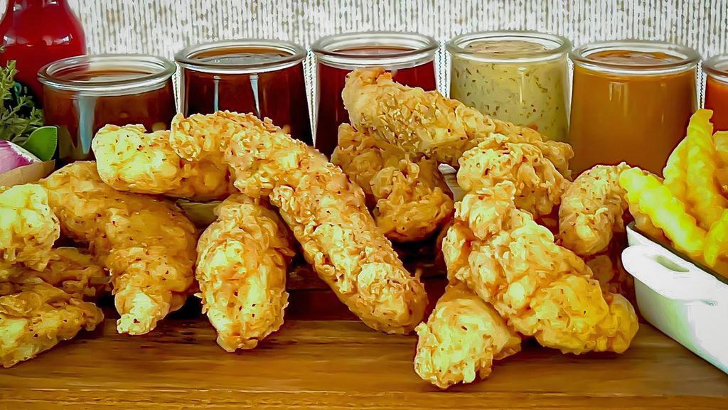 Chicken Tenders · Eight crispy white meat chicken tenders fried to perfection and paired with your favorite sauce.