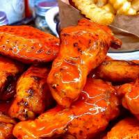 Chicken Wing Combo · Jumbo bone-in chicken wings, deep fried and tossed in any of out signature sauces or dry rub...