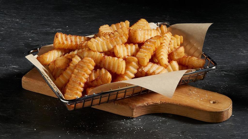 Large Seasoned Fries · Crispy, golden crinkle cut French fries seasoned to perfection