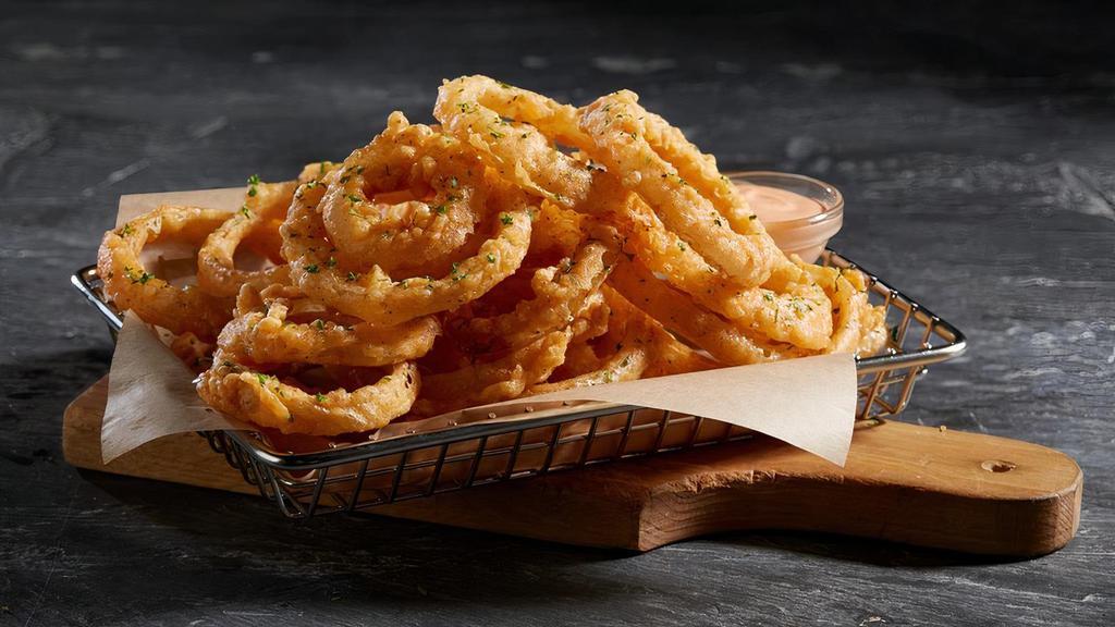 Large Onion Rings · Fresh cut onions, hand breaded and deep fried. A perfect pairing for your chicken of choice.