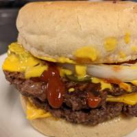 Double Bobert With Cheese Combo · Two ¼ lb. Bobert burgers topped with onions, pickles and two slices of American cheese on a ...