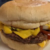 Single Bobert With Cheese · One ¼ lb. Bobert burger topped with onions, pickles and two slices of American cheese on a h...