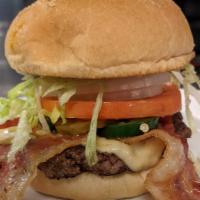 Single Angry Bobert · One ¼ lb. Bobert burger topped with Pepperjack cheese, bacon, jalapeno slices, pickles, onio...
