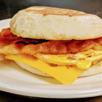 Bacon Egg & Cheese Bobmuffin Combo · Freshly cracked egg on a toasted English Muffin topped with real butter, bacon strips and me...