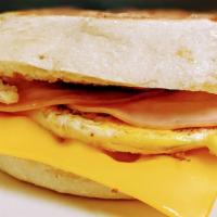 Ham Egg & Cheese Bobmuffin · Freshly cracked egg on a toasted English Muffin topped with real butter, ham slices and melt...