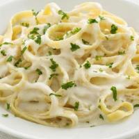 Fettuccine Alfredo · Our rich and creamy Alfredo sauce tossed with Fettuccine.