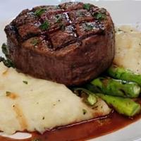 Filet Mignon · 8 oz hand-cut beef tenderloin cooked to perfection. Served with grilled asparagus and au gra...