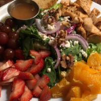 Orange Chicken Salad · Fresh spinach and romaine, grilled chicken, strawberry, grapes, orange, red onion, feta and ...