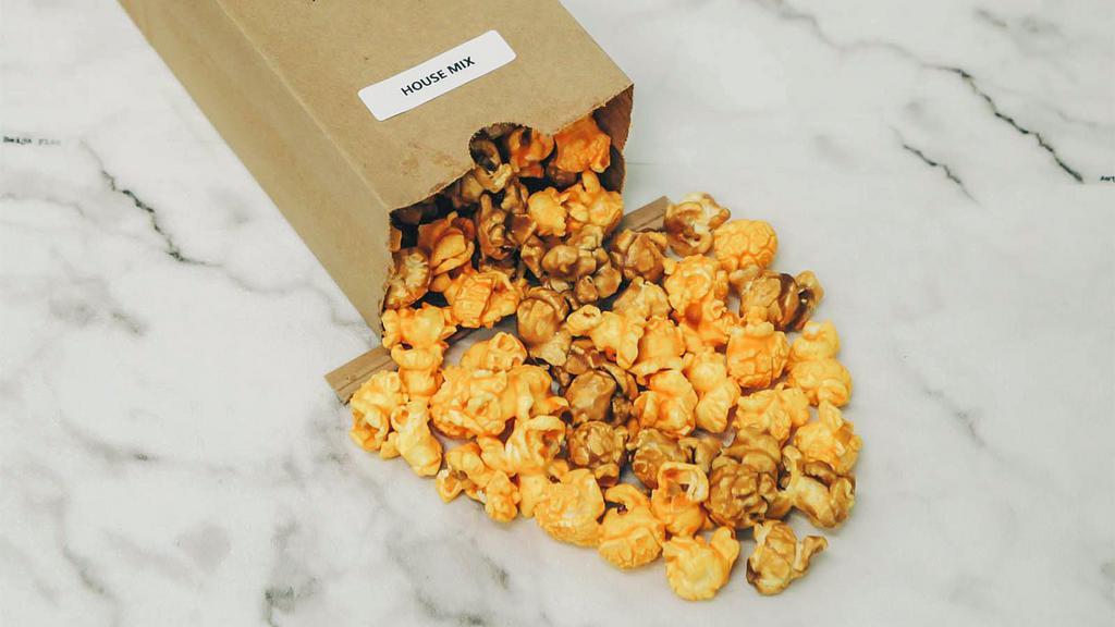Popcorn House Mix · Caramel / Cheddar Mix. Our house specialty features the most buttery, sweet & rich caramel flavor popcorn mixed with our delicious, finger-licking cheesy cheddar. This flavor is the perfect blend of salt and sweet and is everyone’s most loved flavor.