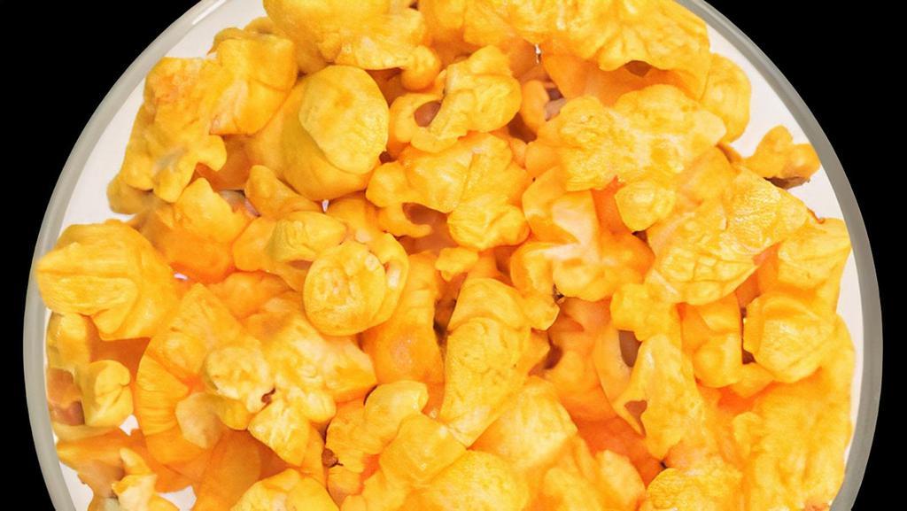 Cheddar · This delicious flavor is the cheesiest and most flavorful cheddar you can find in gourmet popcorn. Our premium cheddar will have you craving more. We want to warn you that your orange fingers are a part of the snacking goodness.