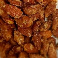 Frosted Praline Nuts · Calling all nut lovers! A mix of pecans and almonds, roasted and covered in a sweet cinnamon...