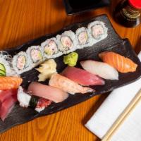 Sushi And Sashimi Combination · Five pieces of sushi, 15 pieces of sashimi and one spicy tuna roll.