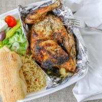 Greek Chicken Salad · Greek salad with char - broiled chicken breast and pita bread.