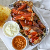 Bbq Rib Tips Dinner · Carefully selected trimmed and seasoned rib tips flame broiled to perfection smothered with ...