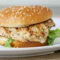Chicken Sandwich · Flame broiled chicken breast served with mayo, lettuce, tomato and raw onion.