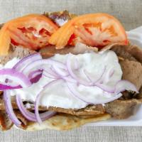 Gyro Sandwich · Served on pita bread with onions,tomatos and cucumber sauce.