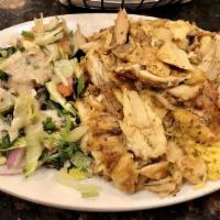 Chicken Shawarma Wrap · thin slices of marinated chicken cooked on a slowly revolving rotisserie served in a wrap wi...