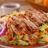 Mesquite Grilled Chicken Salad · 640-1280 cal. Grilled chicken strips served on a bed of fresh mixed greens, shredded cheese,...