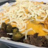Make It Nachos · Your choice of meat and 3 toppings or go healthy with all sauteed veggies.