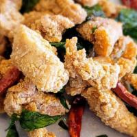Popcorn Chicken · Bite size pieces of popcorn chicken marinated with a special blend of Asian inspired spices,...