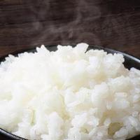 Side Of Steamed Rice · Steamed jasmine white rice.