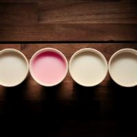 Hot Milk Teas · A non-dairy creamer based hot milk tea, made with your choice of earl grey tea or jasmine gr...
