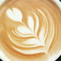 Large Latte · A latte is a coffee drink made with espresso and steamed milk. You can also get it iced. Add...