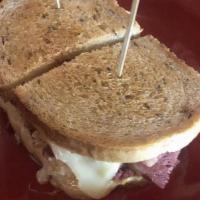 Reuben Sandwich · Grilled rye bread, sauerkraut, homemade thousand islands, swiss cheese, and fresh corned beef.
