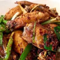 Spicy Zhen (8 Pc) · Spicy. Deep fried wings stir fry with scallions, hot chili, and signature seasoning