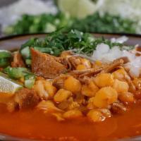 Pozole · Traditional pre-columbian Mexican soup made from hominy corn, your choice of pork or chicken...