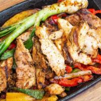 Fajitas · Flat grilled red & yellow bell peppers, poblano peppers & red onions, served with rice & bea...
