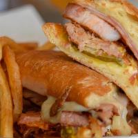 Cubano · smoked ham, pork, swiss cheese, yellow mustard, spicy bread & butter pickles, mayo