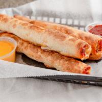 Pepperoni Sticks · Three fresh-baked breadsticks stuffed with pepperoni and cheese served with a choice of red ...