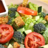 Side Salad · For the smaller appetite we offer a side salad
with lettuce, tomato, cucumbers, broccoli,
cr...