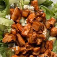 Tipperary Buffalo Chicken Salad · Grilled or fried buffalo chicken served with romaine lettuce, cucumbers, tomatoes and blue c...