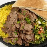 Beef Shawarma · Fire-roasted beef & lamb, sliced thin off a spit.