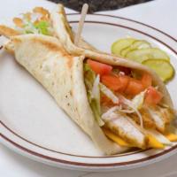 Kerby Melt · Chicken tenders, swiss, and American cheese, lettuce, tomato, and mayonnaise in a pita.