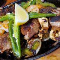 Parrillada Mexicana · Steak, chicken, shrimp, pork and chorizo.
