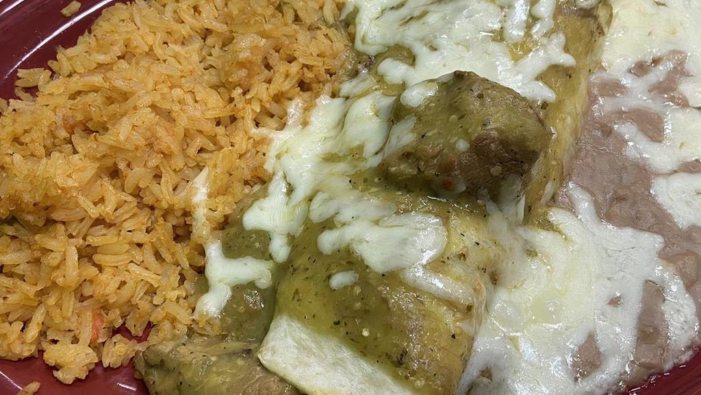Burrito Chile Verde · Pork pieces tossed on chile Verde sauce and wrapped on a flour tortilla covered with salsa Verde. Served with rice and beans.