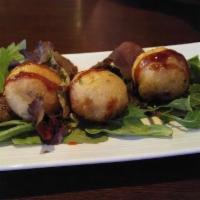 Takoyaki · Batter made from octopus and shapped into a ball.