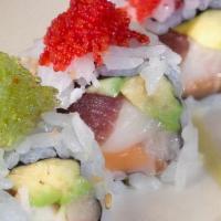 Four Season Roll · Inside: Tuna, salmon, white tuna, white fish, avocad. Outside: Black, orange, red and green ...