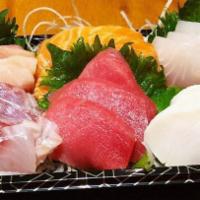 Sashimi Deluxe · 15 pieces of assorted sashimi.
Thoroughly cooking meats, poultry, seafood, shellfish, or egg...