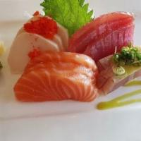 Sashimi Regular · 12 pieces of assorted sashimi.
Thoroughly cooking meats, poultry, seafood, shellfish, or egg...