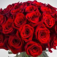 3 Dozen Red Roses · 3 dozen red roses in a vase.
Love and romance / Annaersary