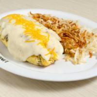 Biscuit & Gravy Omelet · Omelet mixed with biscuits, sausage, cheddar cheese & topped with homemade sausage gravy. No...